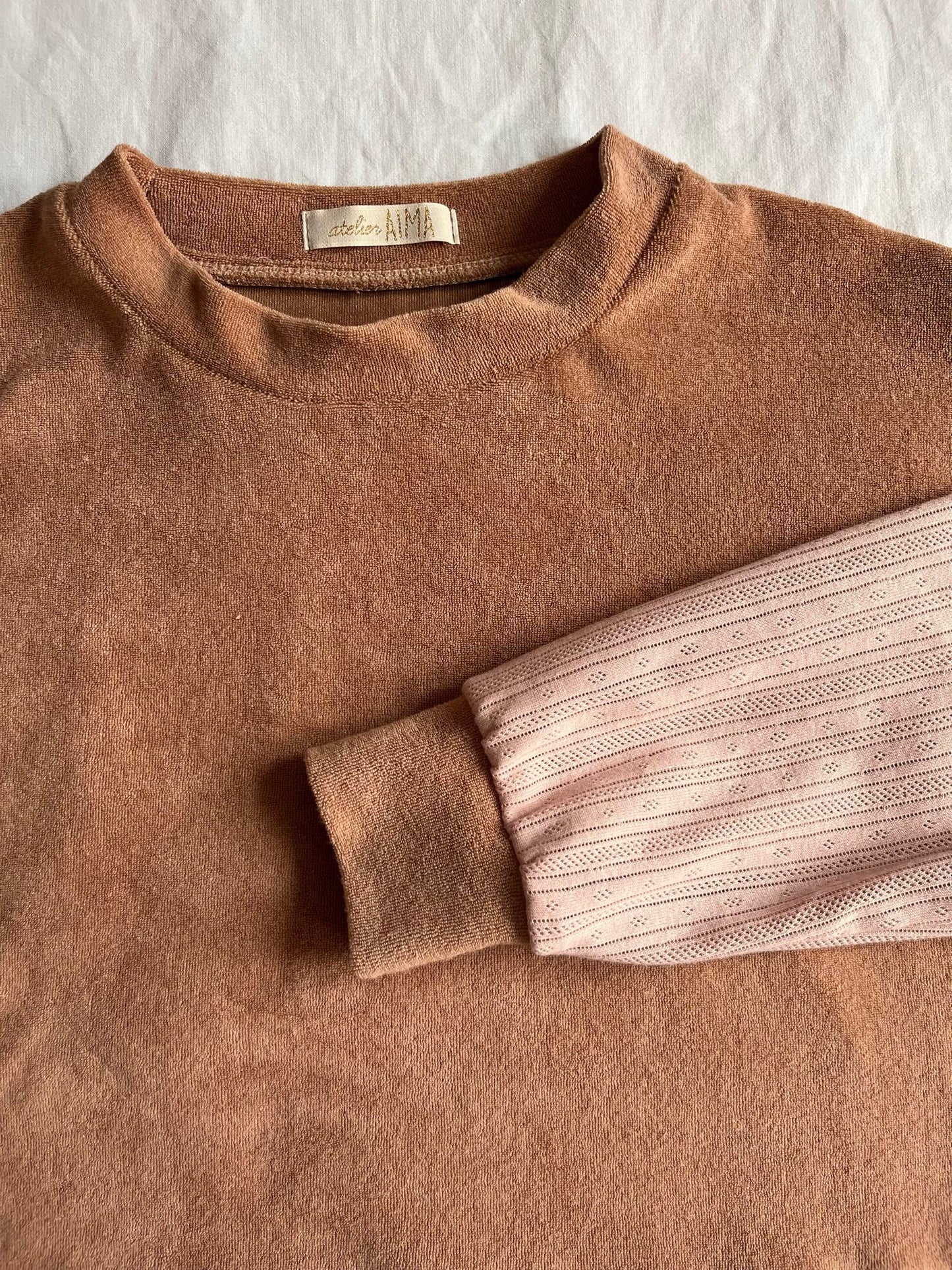 Pull velours rose bi-matière
