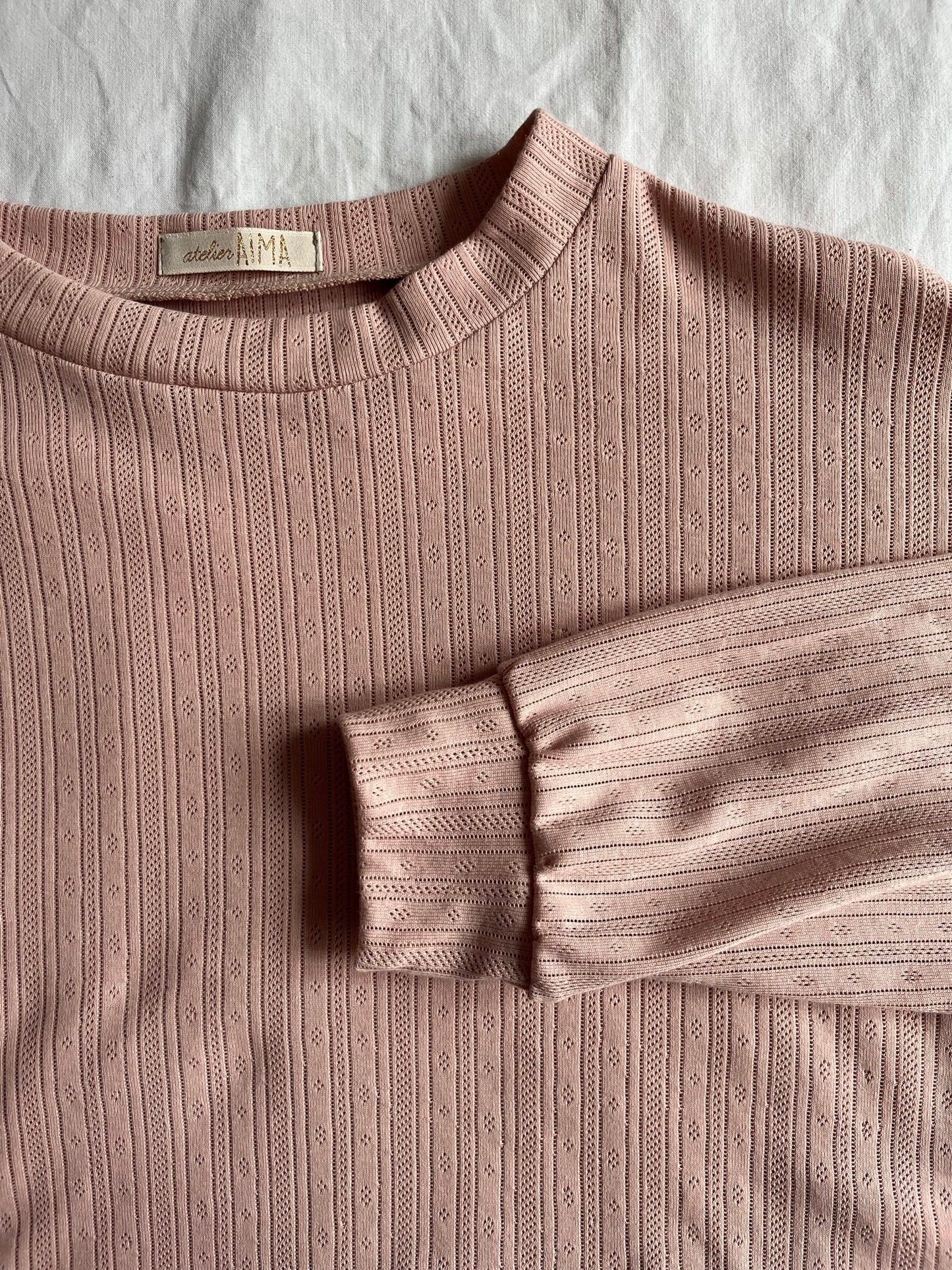 Pull velours rose